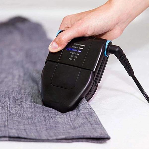 Portable folding ironing machine